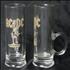 AC/DC Stiff Upper Lip Shot Glasses - Both With Handles memorabilia US ACDMMST458134