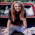 Britney Spears Signed Photo - Sitting On The Back Of A Pick-Up Truck photograph UK BTPPHSI365190