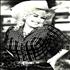 Dolly Parton Autographed 'Cowgirl' Publicity Photograph photograph US PARPHAU260672