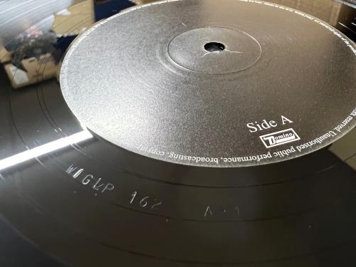 Arctic Monkeys Whatever People Say I Am, That's What I'm Not - 1st vinyl LP album (LP record) UK MEOLPWH347308