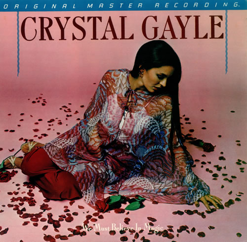 Crystal Gayle We Must Believe In Magic vinyl LP album (LP record) US CGYLPWE441111