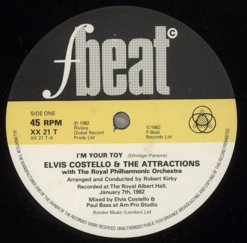 Elvis Costello I'm Your Toy - Sticker 12" vinyl single (12 inch record / Maxi-single) UK COS12IM880726
