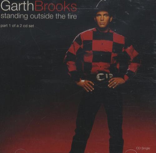 garth brooks standing outside the fire