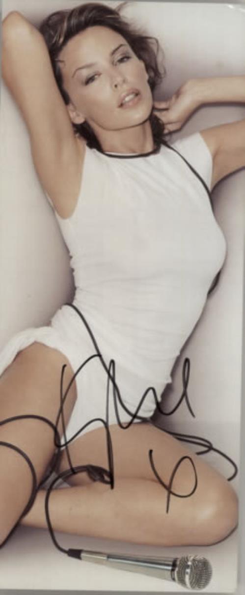 Kylie Minogue Can't Get You Out Of My Head - Autographed Photograph memorabilia UK KYLMMCA586508