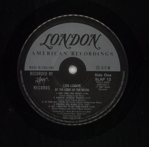 Los Lobos By The Light Of The Moon - Promo Stamp vinyl LP album (LP record) UK LOSLPBY863826