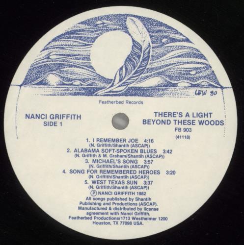 Nanci Griffith There's A Light Beyond These Woods - VG vinyl LP album (LP record) US NANLPTH880393
