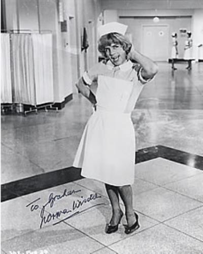 Norman Wisdom Autographed 'Nurse' Photograph photograph UK N/WPHAU262480