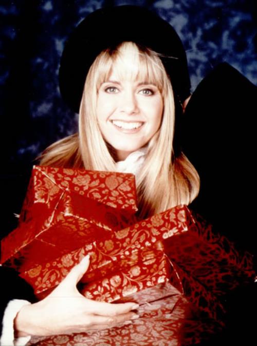 Olivia Newton John Picking Up The Presents photograph UK ONJPHPI528623