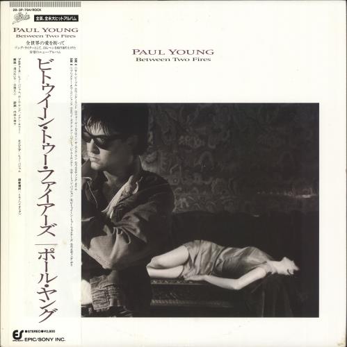 Paul Young Between Two Fires vinyl LP album (LP record) Japanese PYOLPBE631952