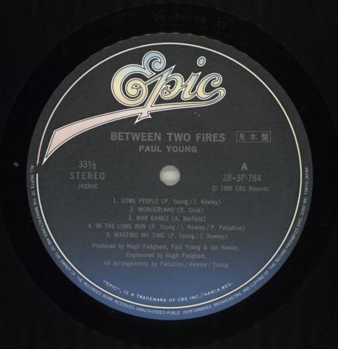 Paul Young Between Two Fires vinyl LP album (LP record) Japanese PYOLPBE631952