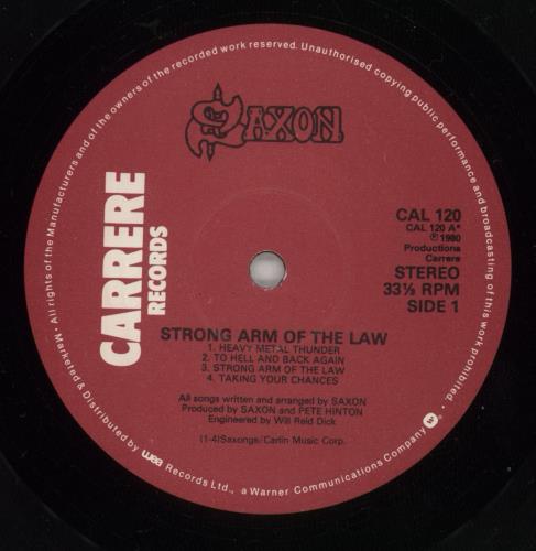 Saxon Strong Arm Of The Law vinyl LP album (LP record) UK SAXLPST668320