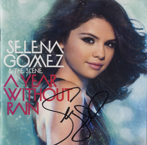 Selena Gomez A Year Without Rain - Autographed CD album (CDLP) US UELCDAY552855