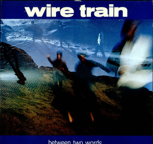 Wire Train Between Two Words - Gold promo stamped vinyl LP album (LP record) UK WI7LPBE506337